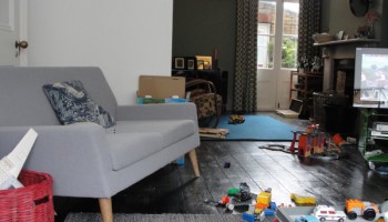 toy strewn living room